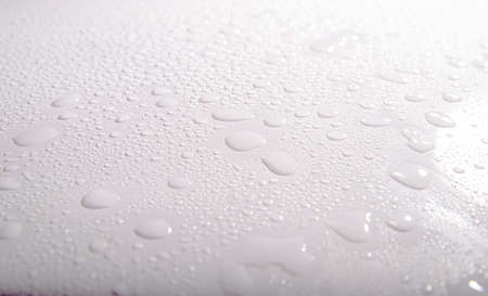 natural water drop texture. Full Frame Shot Of Water Drops On White Table.の写真素材