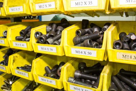 arrangement of yellow toolbox with socket screw