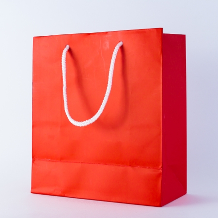 isolation on white of red shopping bagの写真素材