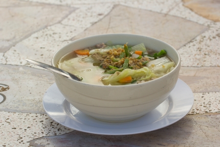 healthy soup with white bowl in the morning lightの写真素材