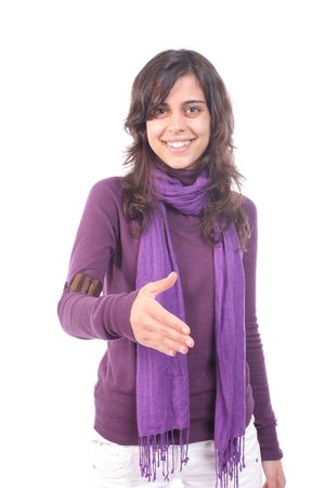 Young beautiful girl offering to shake hands, isolated on white backgroundの写真素材