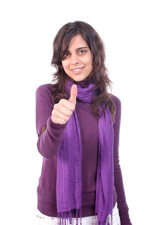 Young beautiful girl signaling thumbs up, isolated on whiteの写真素材