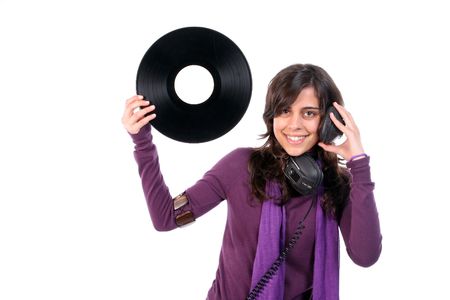 Young Beautiful girl with vinyl and headphones, isolated on white backgroundの写真素材