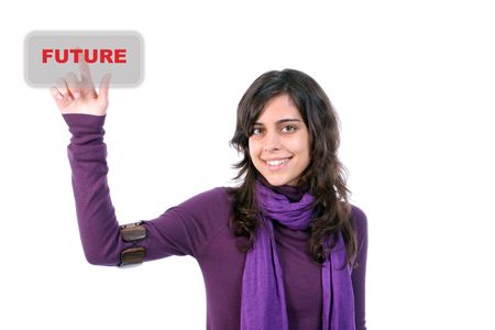 Young beautiful woman pressing the future key, isolated on white backgroundの写真素材