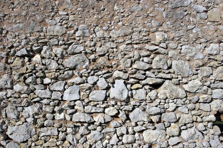 Very old and ruined castle wall, isolatedの写真素材