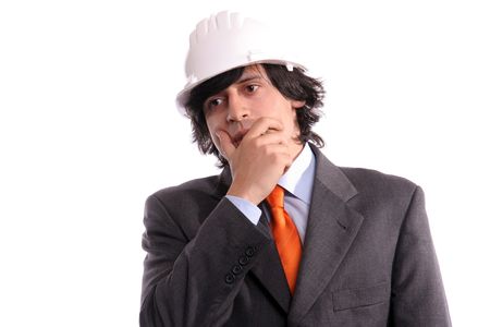 Young Engineer, full of thoughts, isolated in white backgroundの写真素材