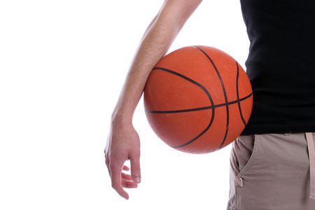Detail of casual man holding a basketball ball, isolated in white backgroundの写真素材