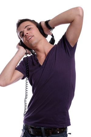 Casual man listening to music, isolated in white backgroundの写真素材