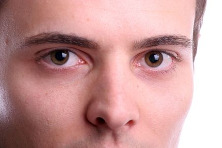 Extreme closeup portrait of young businessman - isolated in white backgroundの写真素材