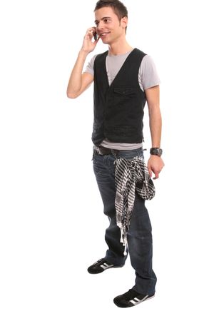 Young handsome boy calling on cellphone, isolated in white backgroundの写真素材
