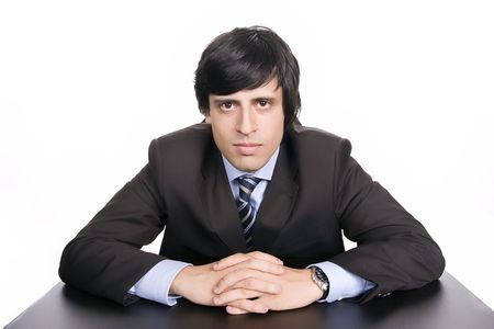 Young Businessman posing, isolated in white backgroundの写真素材