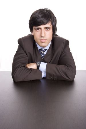 Young Businessman posing, isolated in white backgroundの写真素材