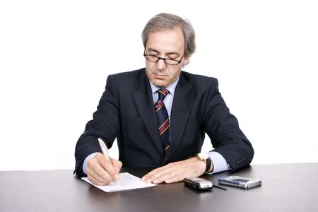 Mature businessman working, isolated over white backgroundの写真素材