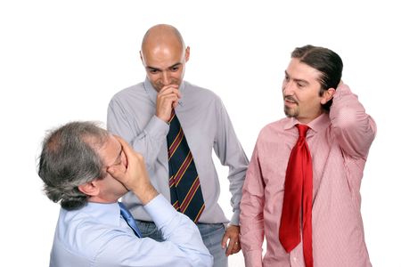 Unhappy business team, manager praying for better days, shot taken from manager's perspectiveの写真素材