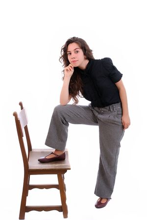 Young girl posing, isolated over white backgroundの写真素材