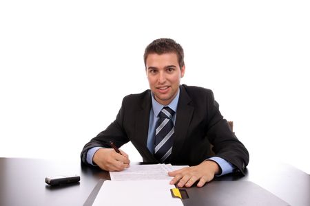 young businessman at work, isolated over whiteの写真素材