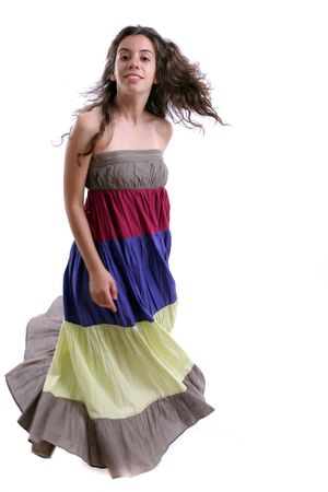 Beautiful lady dancing in long dress - image full of movementの写真素材