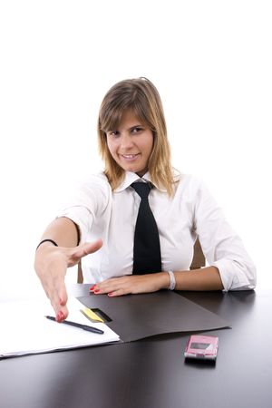 young businesswoman offering to shake the hand, isolated over white backgroundの写真素材
