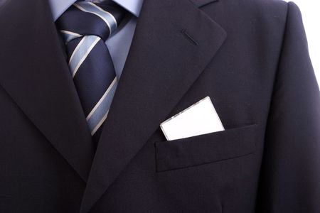 businessman with a blank business card in his pocket, isolated over whiteの写真素材