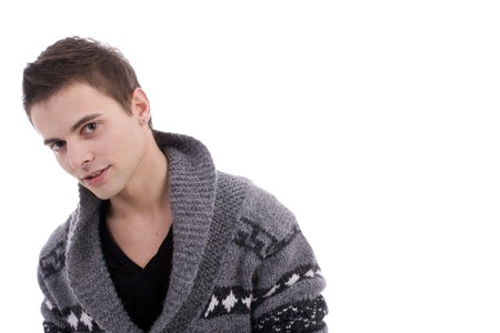 Young casual boy posing isolated over whiteの写真素材