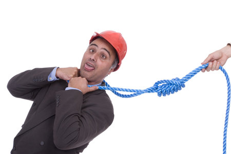 Businessman being pulled by a rope around his neckの写真素材