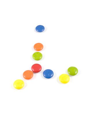 Letter I made of colored smarties, isolated over whiteの写真素材