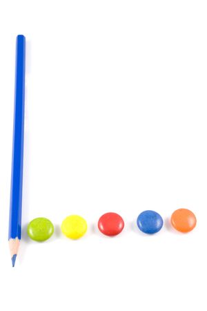 Letter L made of colored smarties, isolated over whiteの写真素材
