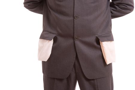Man with empty pockets, isolated over white backgroundの写真素材
