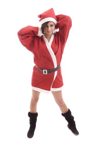 Young Santa Girl posing isolated over white backgroundの写真素材