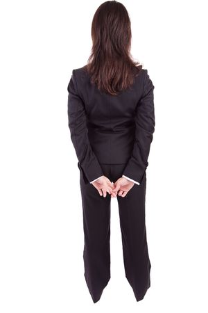 Business woman posing backwards isolated over whiteの写真素材