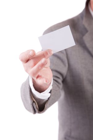 Business man offering card, focus on the handの写真素材