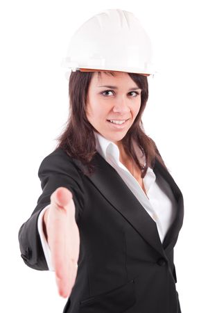 Young engineer, offering handshake - isolated over whiteの写真素材