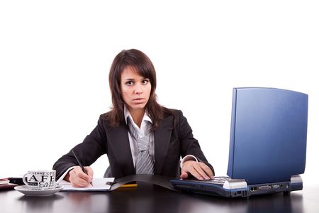 Business woman working with laptop, isolated over whiteの写真素材