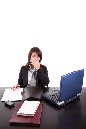 Tired business woman, working with laptopの写真素材