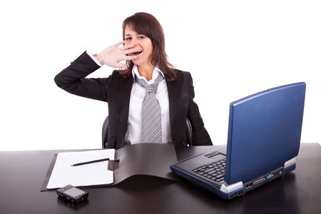 Tired business woman, working with laptopの写真素材