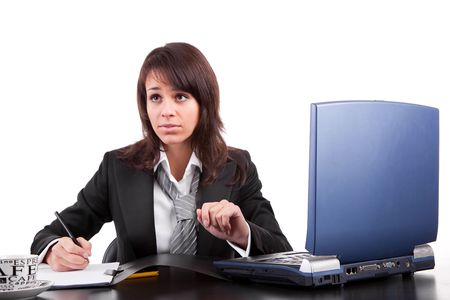 Business woman working with laptop, isolated over whiteの写真素材
