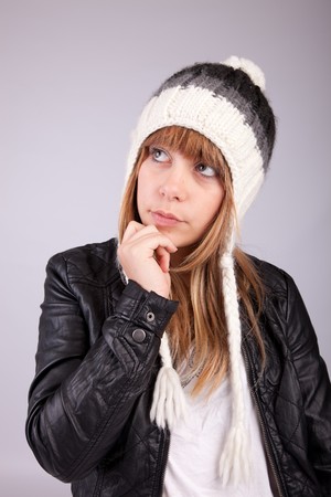 Beautiful woman posing, isolated over grey backgroundの写真素材