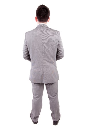 Business man posing backwards isolated over whiteの写真素材