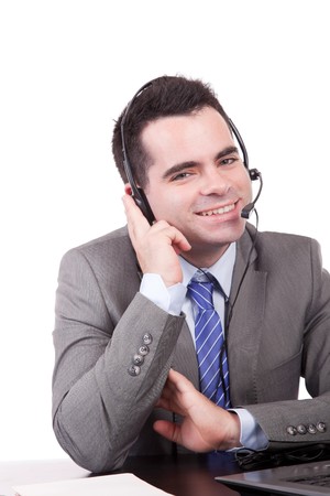 Friendly telephone operator isolated over whiteの写真素材
