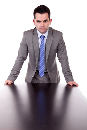 Young business man posing, isolated over whiteの写真素材