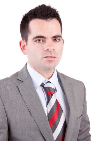 Young business man posing, isolated over whiteの写真素材