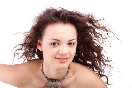  Young and beautiful brunette portrait - isolatedの写真素材