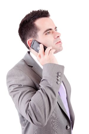 Business man at the phone, isolated over whiteの写真素材