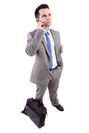 Business man at the phone, isolated over whiteの写真素材