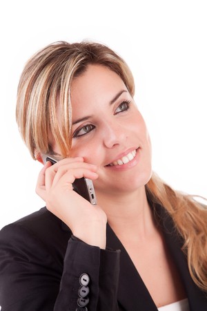 Business woman at the phone - isolated over whiteの写真素材