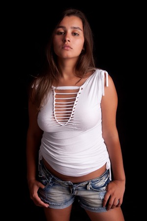 Young and beautiful woman posing - isolatedの写真素材