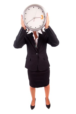 Business woman holding a clock, isolatedの写真素材