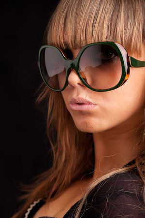 Low Key Portrait - Woman in sunglassesの写真素材