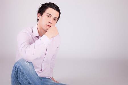 Young casual boy posing isolatedの写真素材