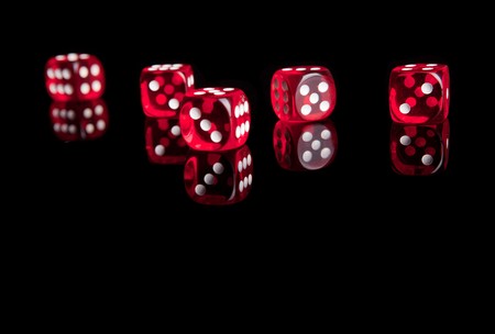 Red dices isolated with reflectionの写真素材
